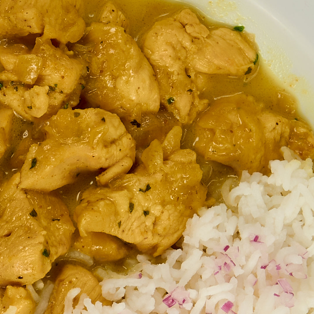 Pollo al curry con arroz basmati - ensupuntoadomicilio